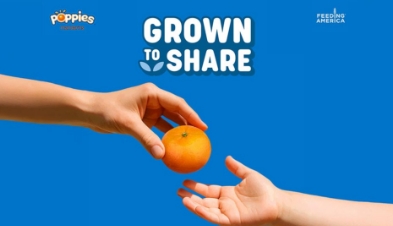 The Poppies Mandarins Grown to Share campaign, one hand passing an orange to another